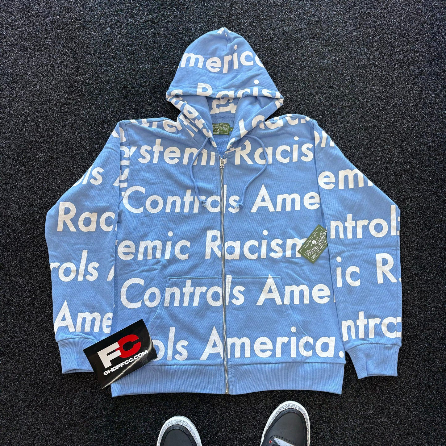 DENIM TEARS SYSTEMIC RACISM HOODIE DUSTY BLUE