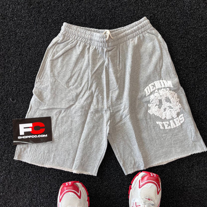 DENIM TEARS UNIVERSITY SHORTS GREY